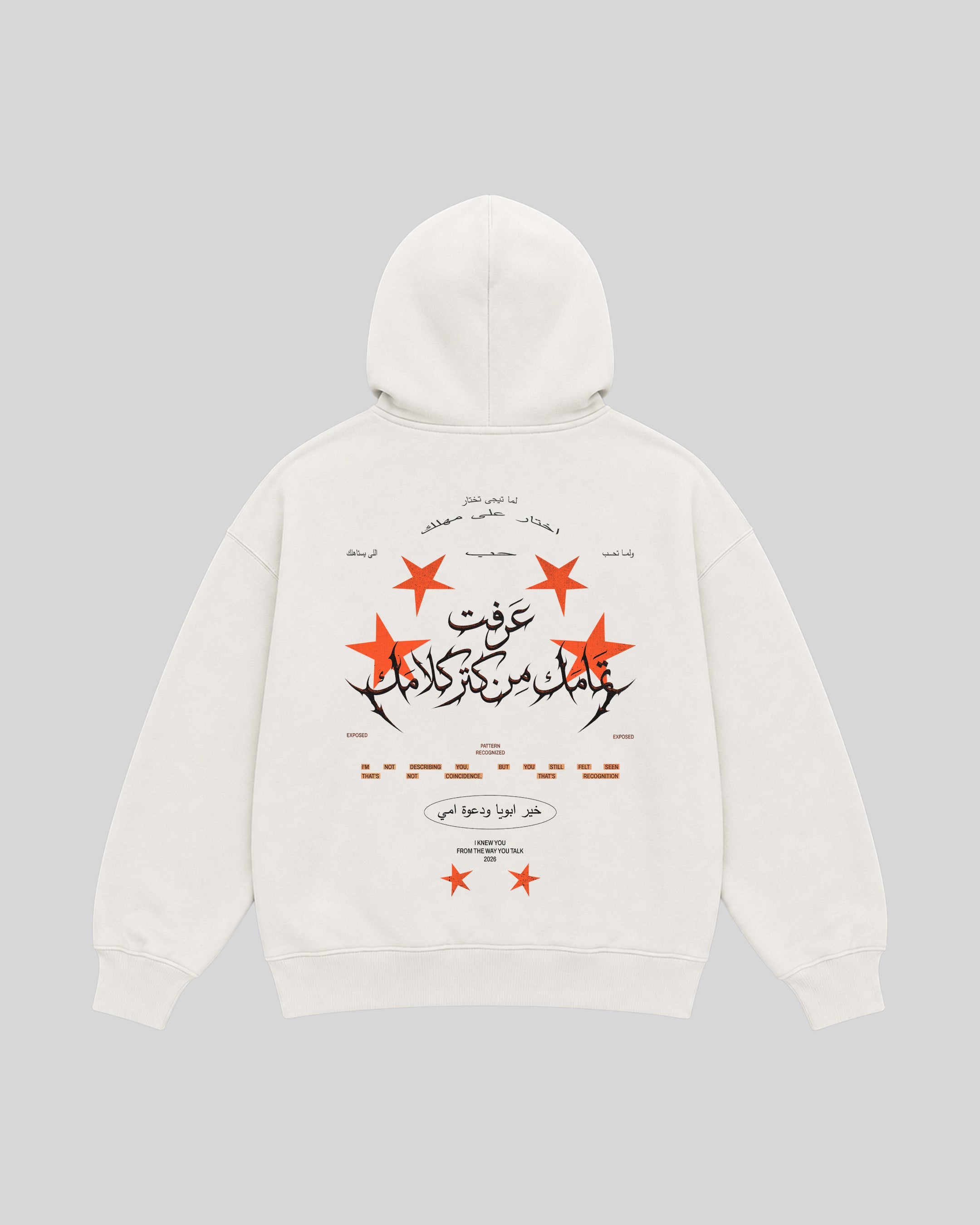 All Talk Hoodie in white, back view with Arabic typography