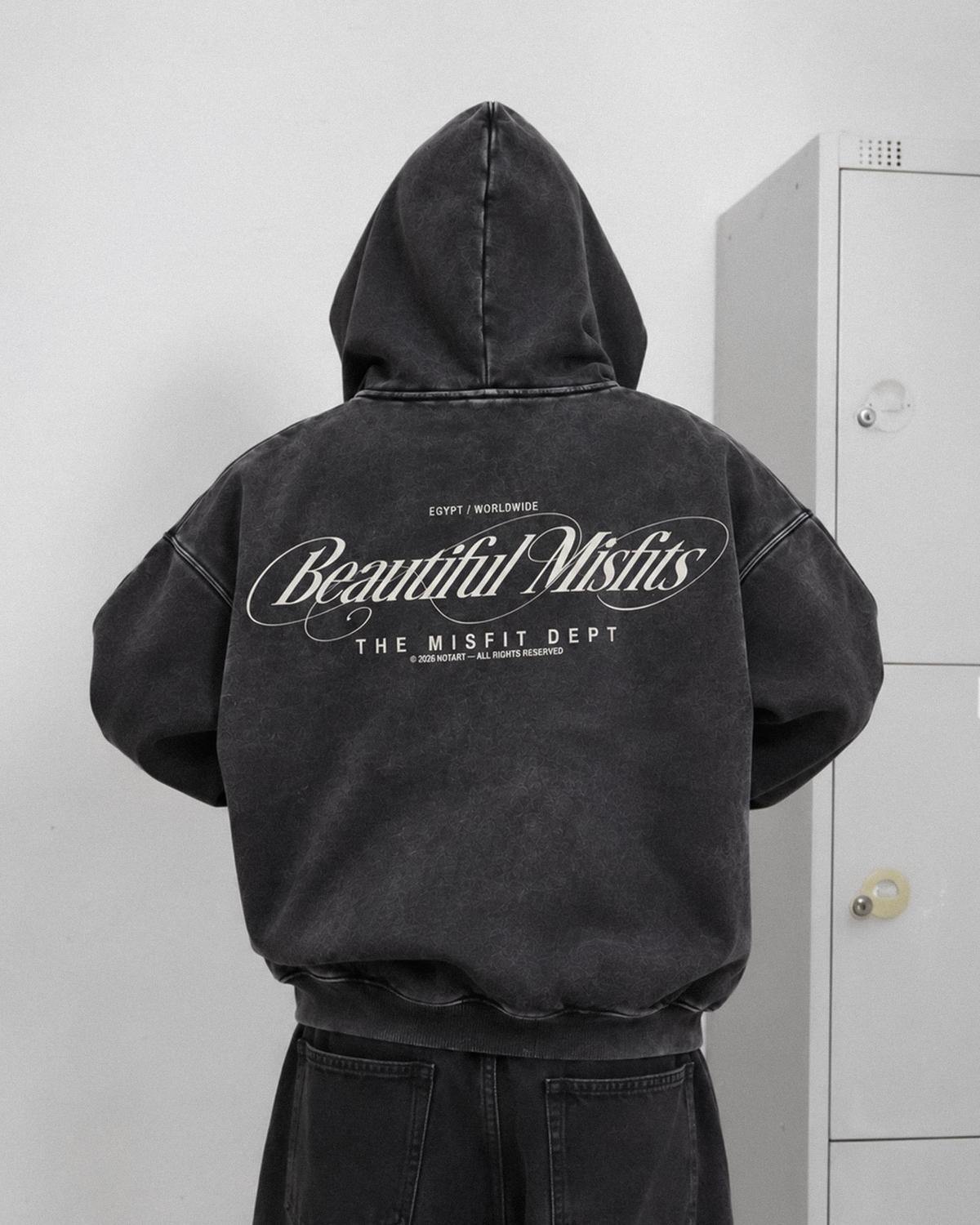 Beautiful Misfits Washed Hoodie — dark grey back view on model
