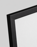 Close-up detail of the black 2 cm poster frame