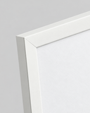 Close-up detail of the white 2 cm poster frame