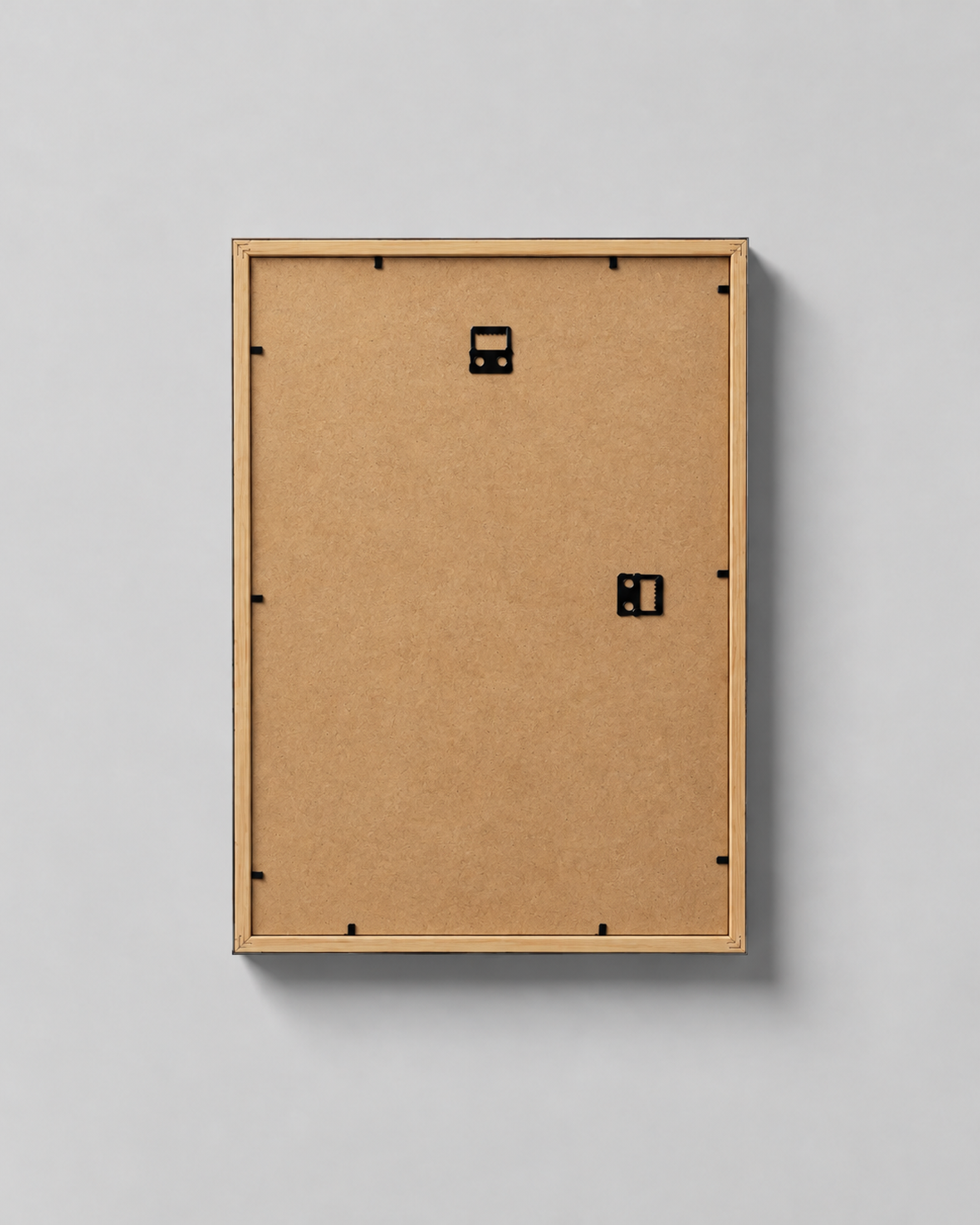Back of the framed poster with vertical and horizontal hanging hardware