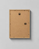Back of the framed poster with vertical and horizontal hanging hardware