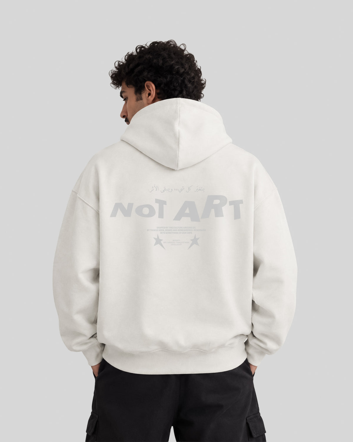 The Trace Hoodie in white, model back view