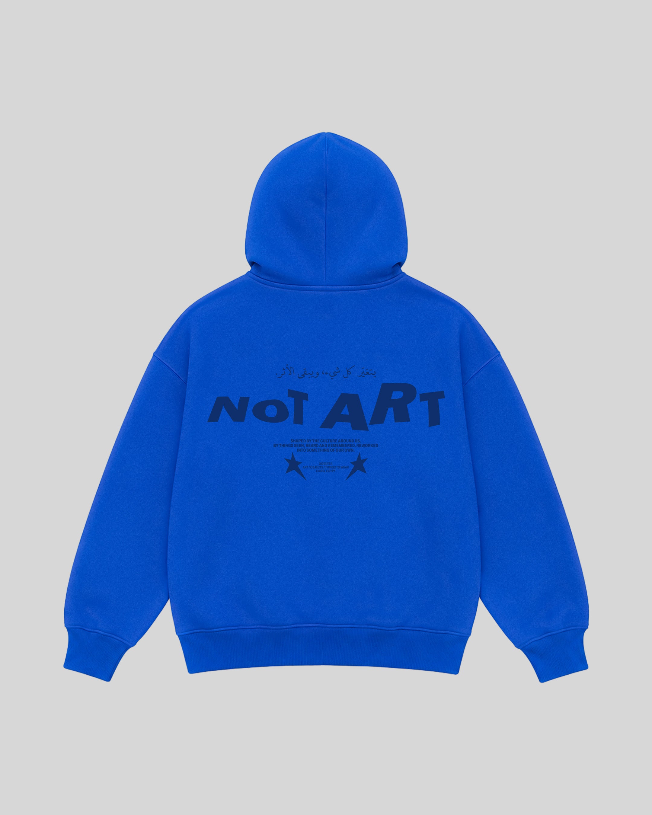The Trace Hoodie in royal blue, back view with NOTART graphic
